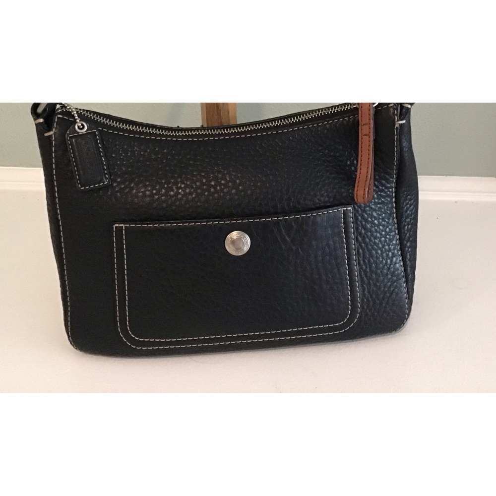 COACH rich brown pebbled leather crossbody bag.